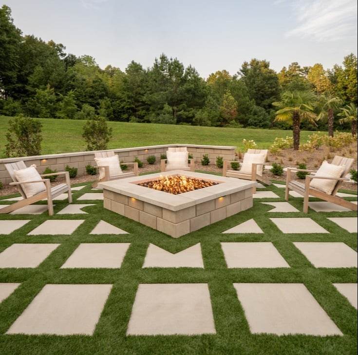 An Image of a Turf Pattern Concrete Patio With Square Fire Pit