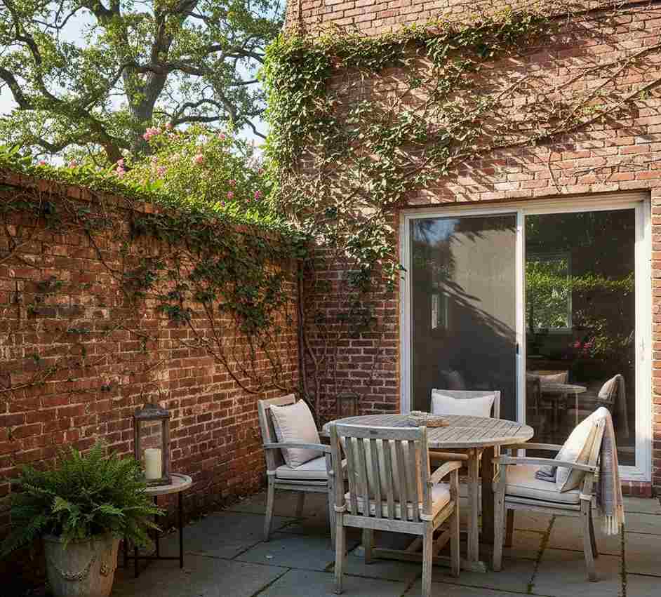 Stacked Brick Fence With Creeper Vines