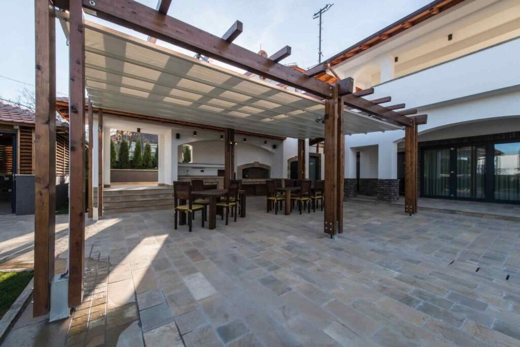 Wooden Pergola Over Paver Stone Patio